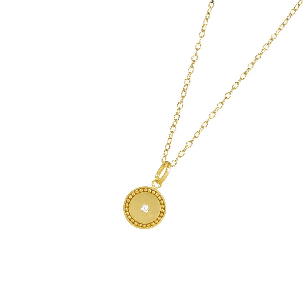 14 Karat Yellow Gold ZAN Disc Pendant with Single Diamond